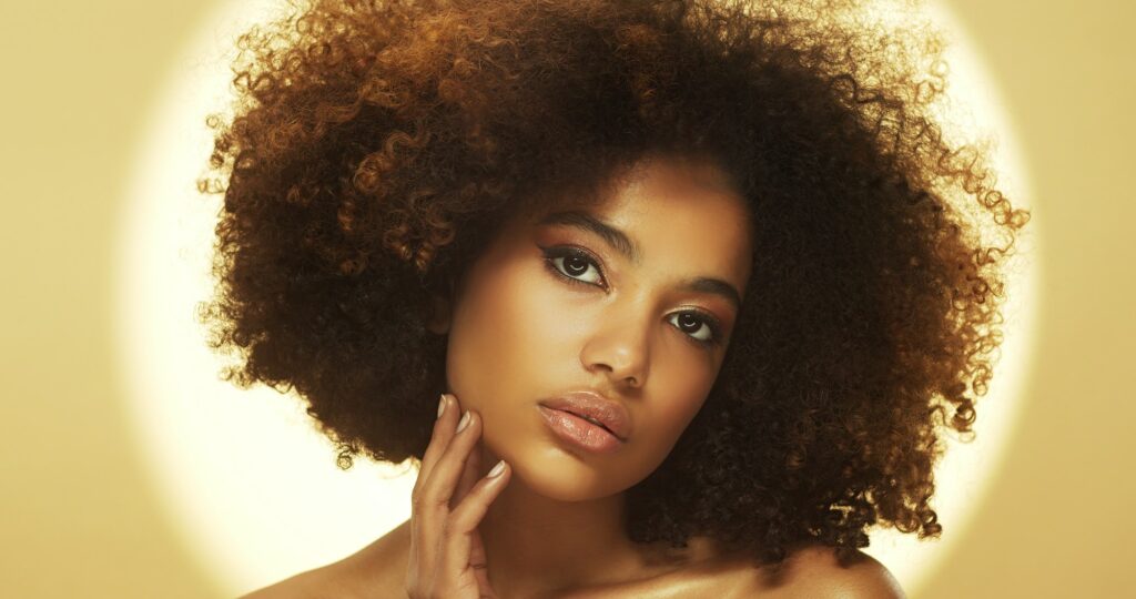 Beauty face portrait of smiling beautiful african woman, skin care ads